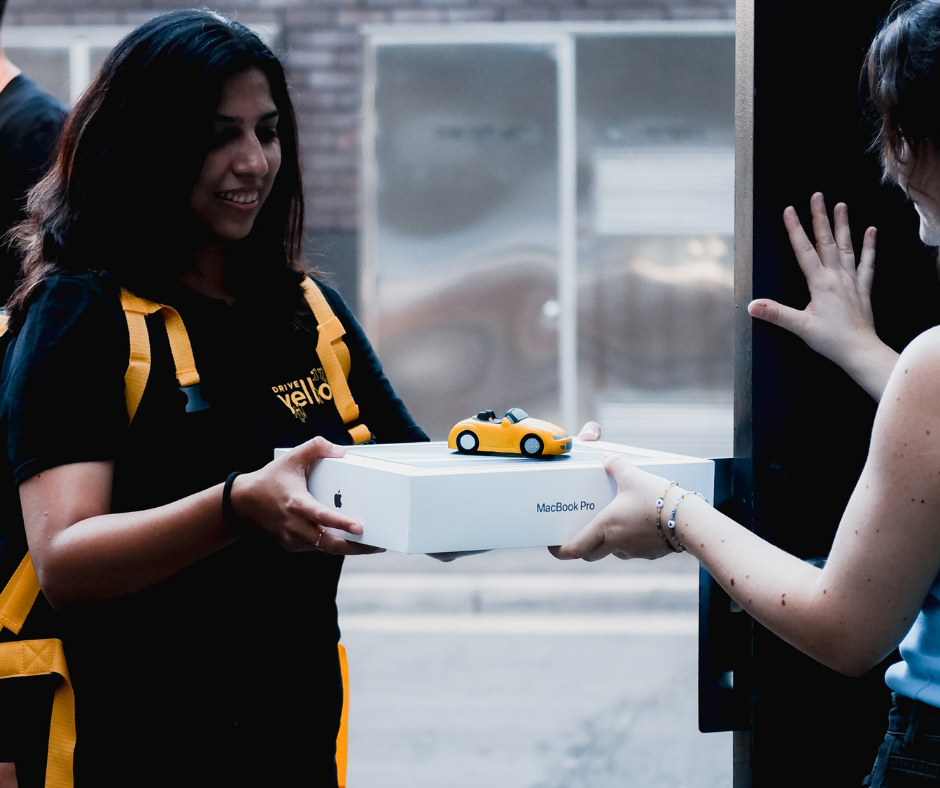 female courier making delivery